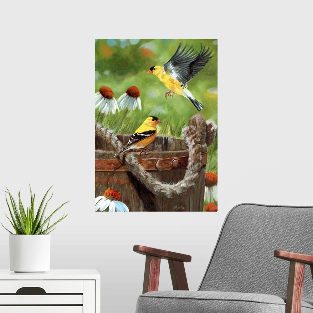 A modern room featuring Two goldfinches near a wooden bucket with a rope handle.