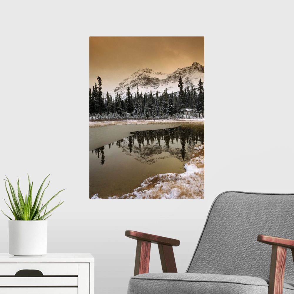 A modern room featuring Canadian Rocky Mountains dusted in snow, Banff National Park, Alberta, Canada