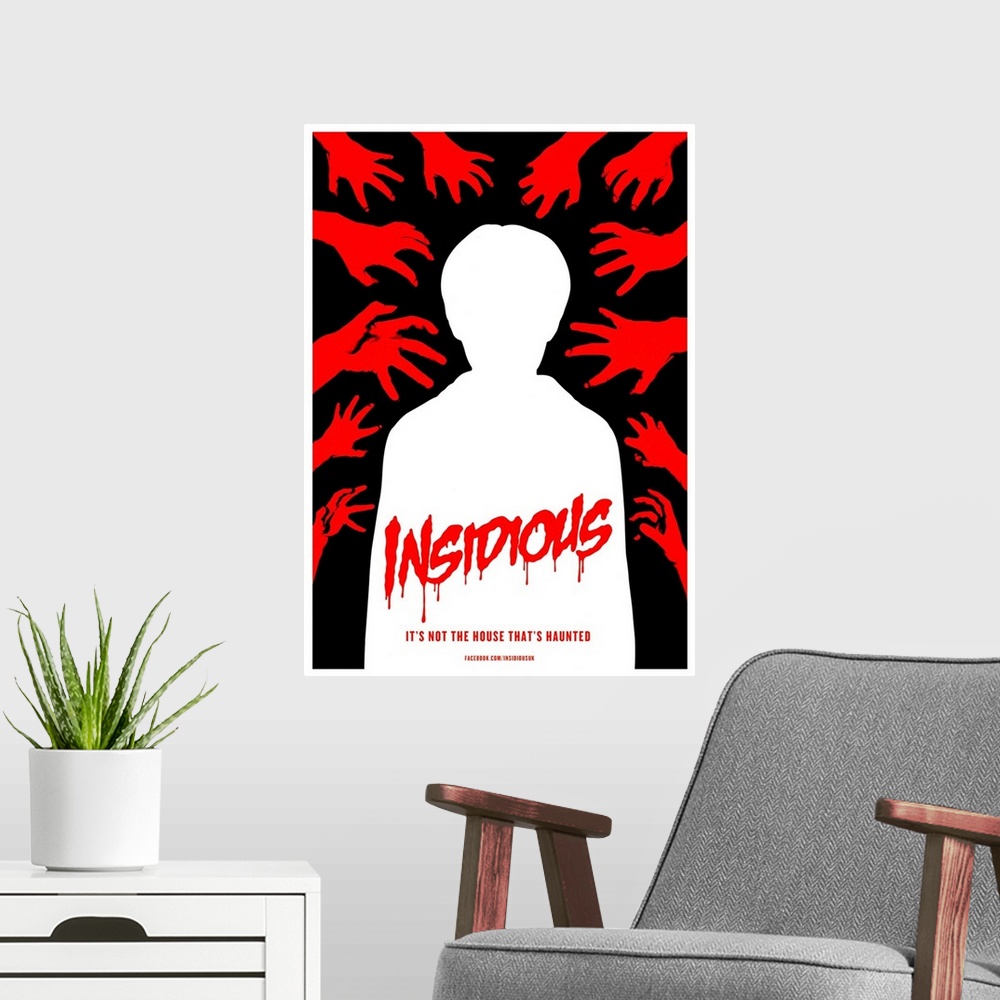 A modern room featuring Insidious - Movie Poster