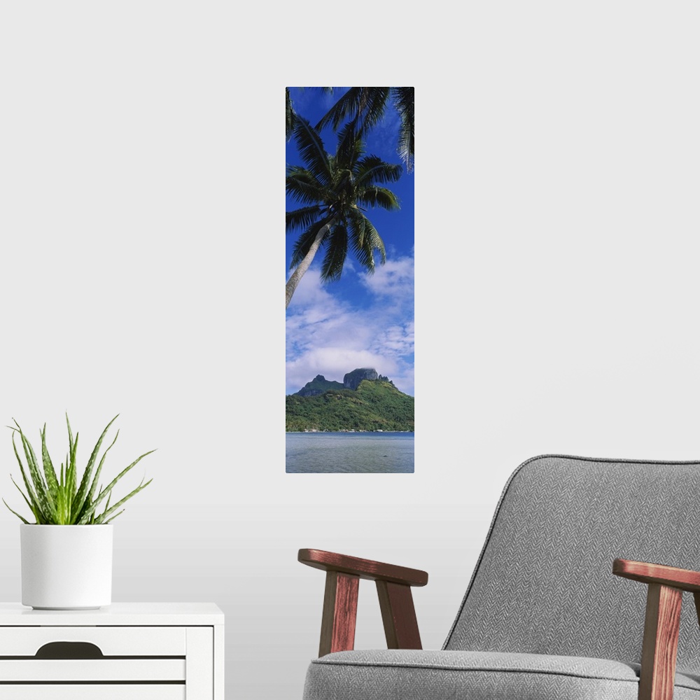 A modern room featuring Clouds over a mountain, Bora Bora, French Polynesia