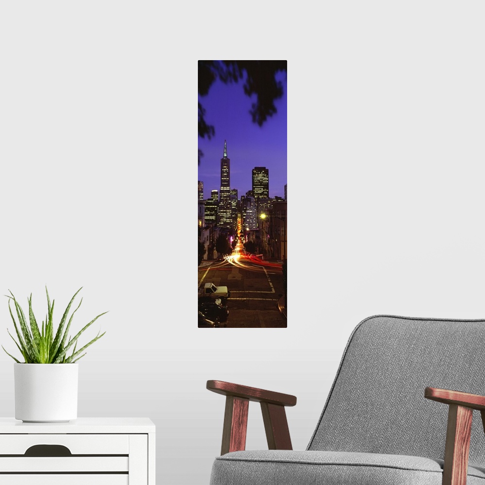 A modern room featuring Colonial building light-up at night, Transamerica Pyramid And Columbus Tower, San Francisco, Cali...
