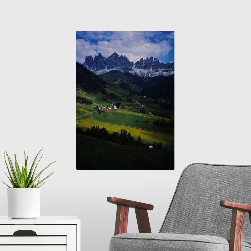 A modern room featuring High angle view of a church on a landscape, Dolomites, Funes Valley, Le Odle, Santa Maddalena, Ty...