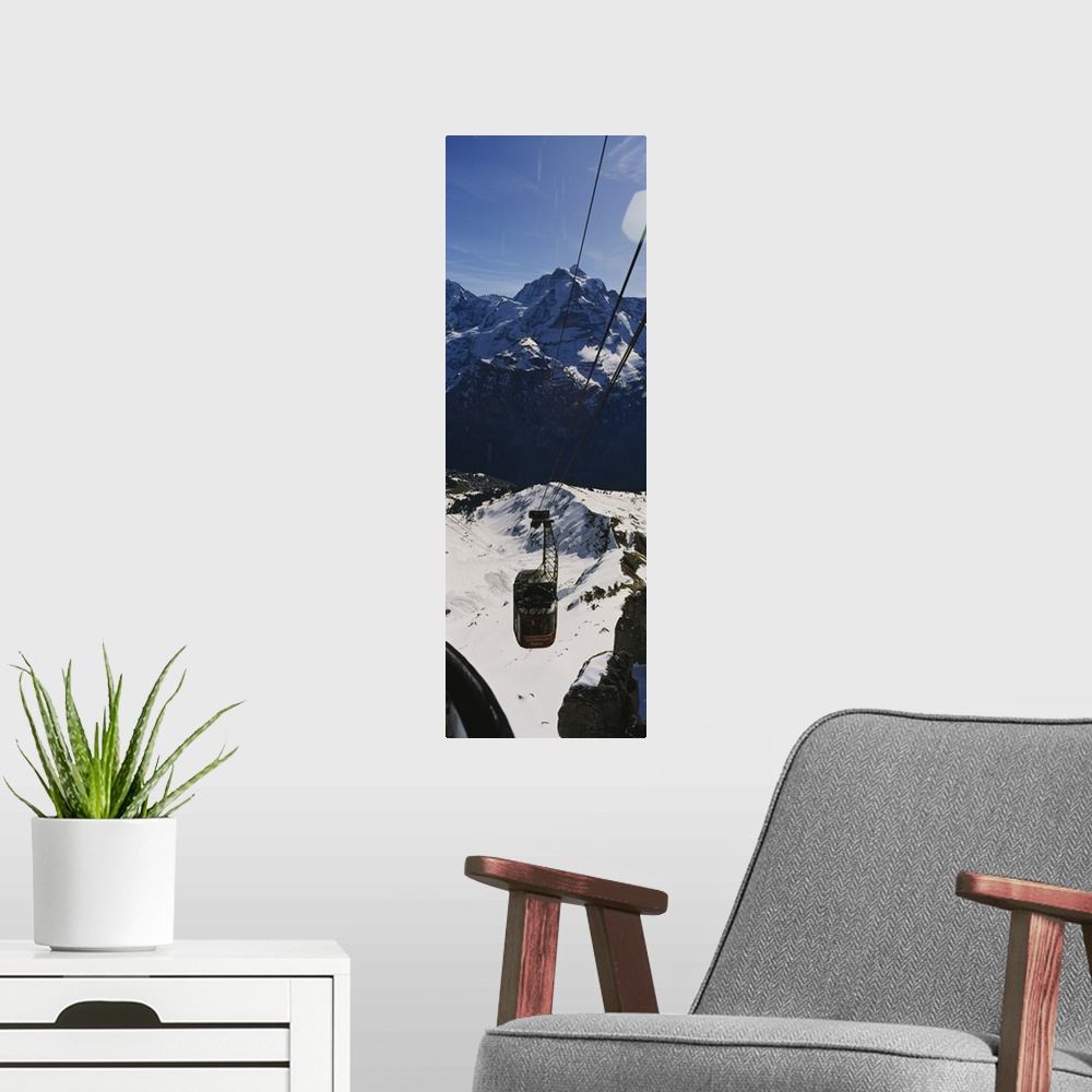 A modern room featuring High angle view of an overhead cable car, Jungfrau, Bernese Oberland, Swiss Alps, Switzerland
