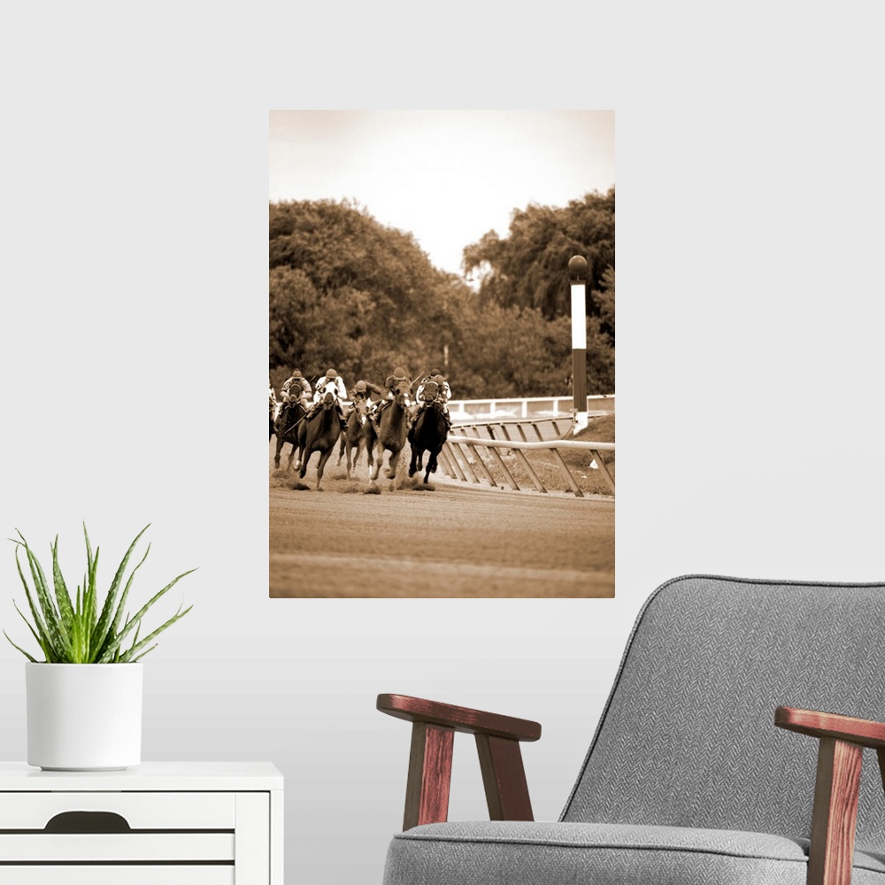 A modern room featuring Arlington Park Group of thoroughbred horses comming out of the turn.