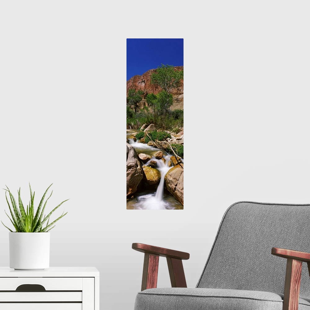 A modern room featuring Little Nankoweap Creek flowing through rocks, Arizona