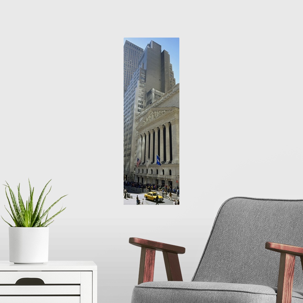 A modern room featuring Low angle view of a stock exchange building, New York Stock Exchange, Manhattan, New York City, N...