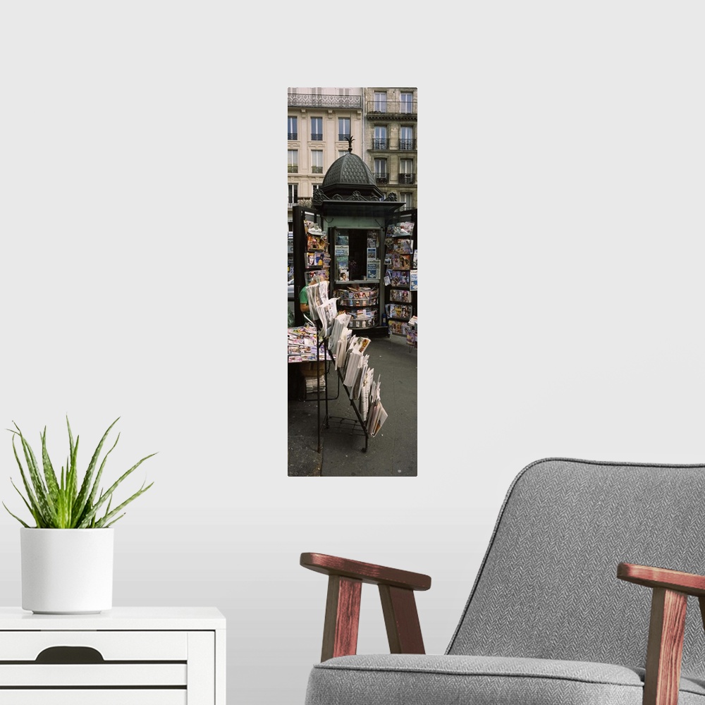 A modern room featuring Newsstand on a street, Paris, France