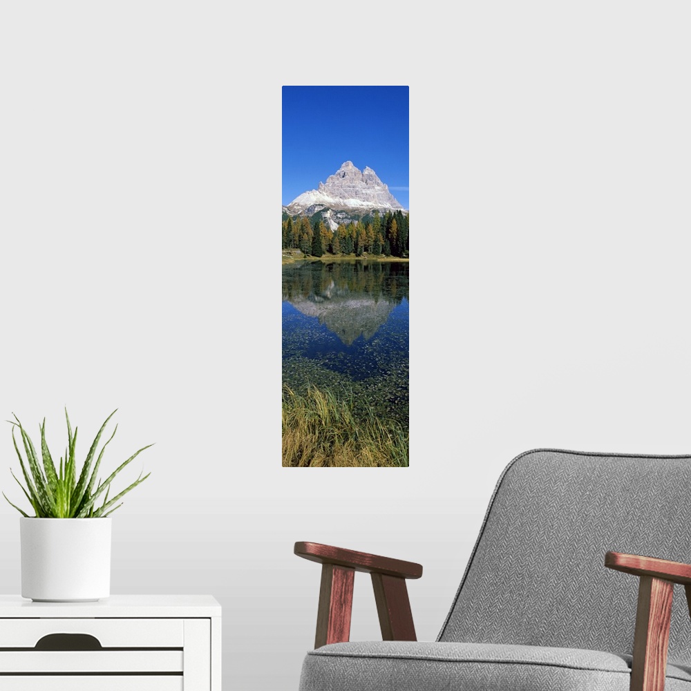 A modern room featuring Reflection of a mountain in a lake, Lake Misurina, Alto Adige, Trentino Alto Adige, Italy