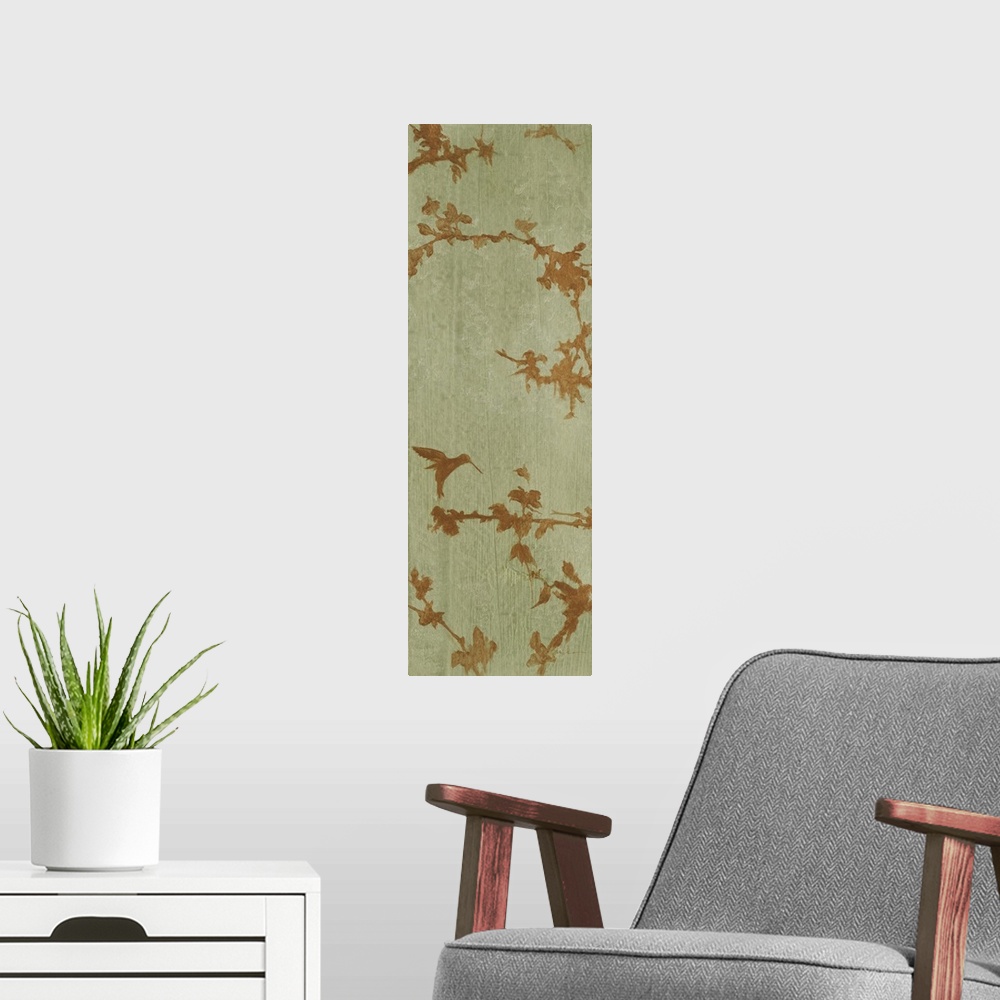 A modern room featuring A long vertical painting of bronze colored leaves on a muted green background.