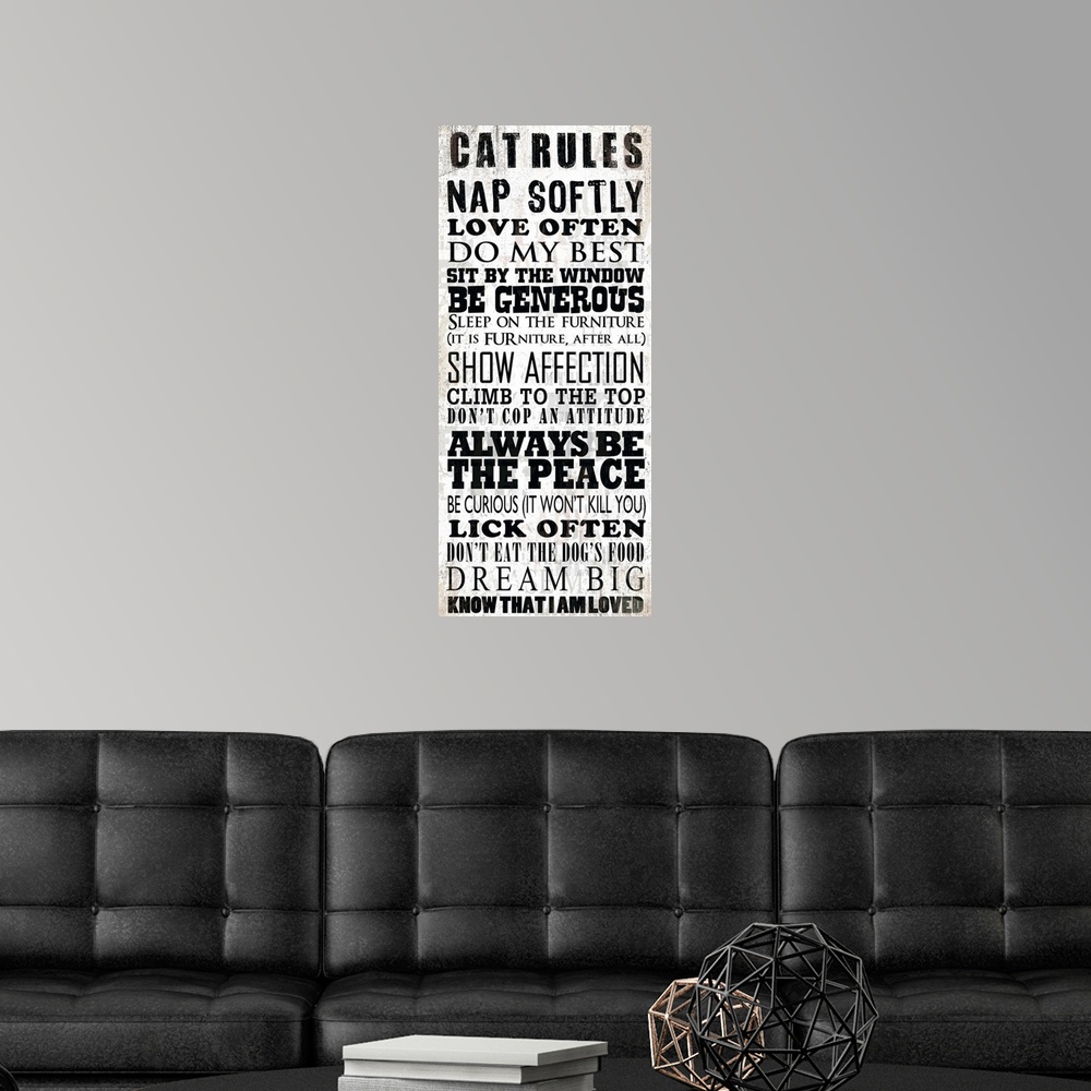 A modern room featuring Cat sentiments in black typography against a tan and white background.