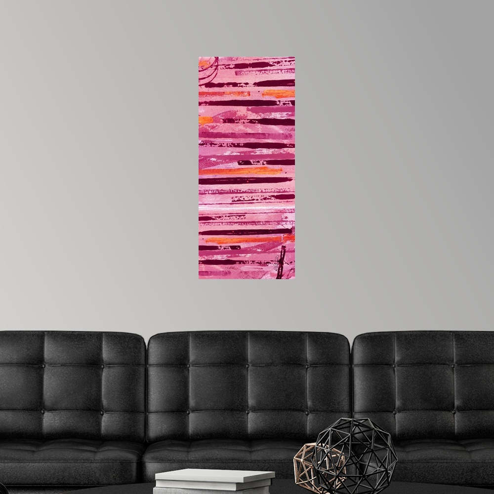 A modern room featuring Tall abstract painting with horizontal lines in shades of pink, orange, and red.