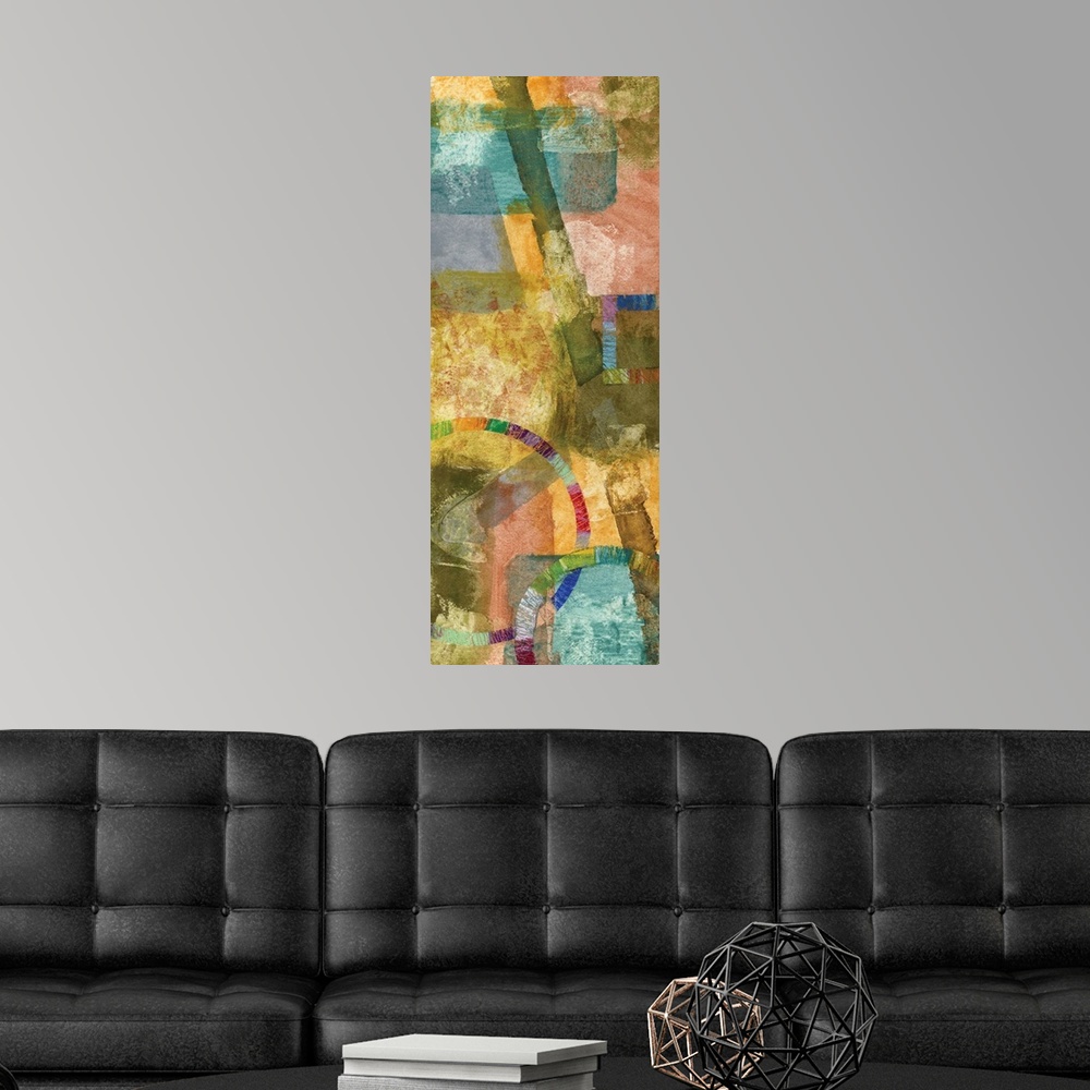 A modern room featuring Contemporary abstract art print in cheerful shades of yellow, pink, and blue.