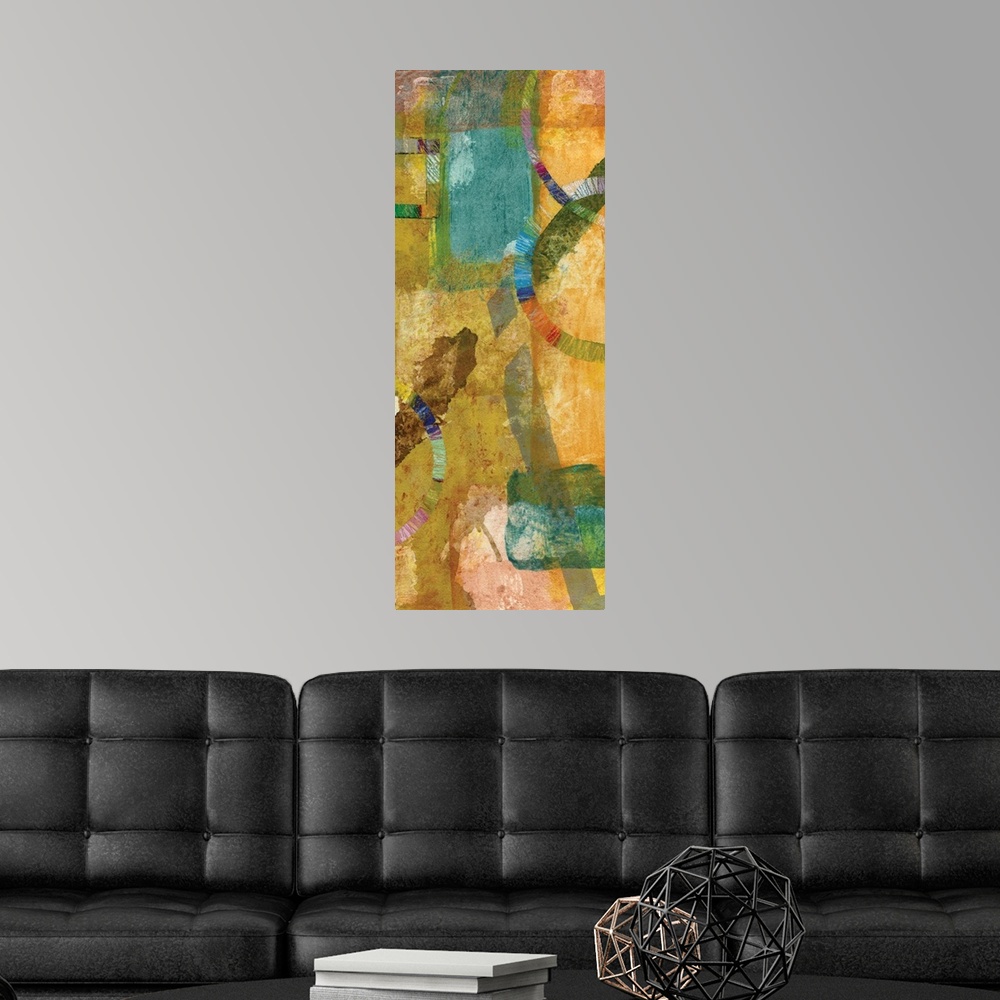 A modern room featuring Contemporary abstract art print in cheerful shades of yellow, pink, and blue.