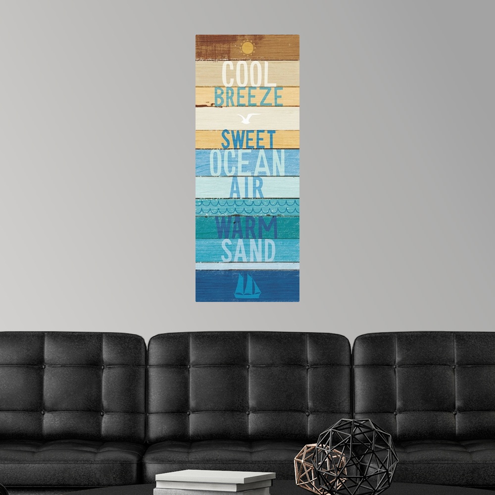 A modern room featuring "Cool Breeze- Sweet Ocean Air- Warm Sand" on a blue and tan wood paneled background.