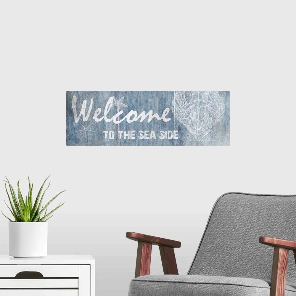 A modern room featuring "Welcome to the Sea Side"