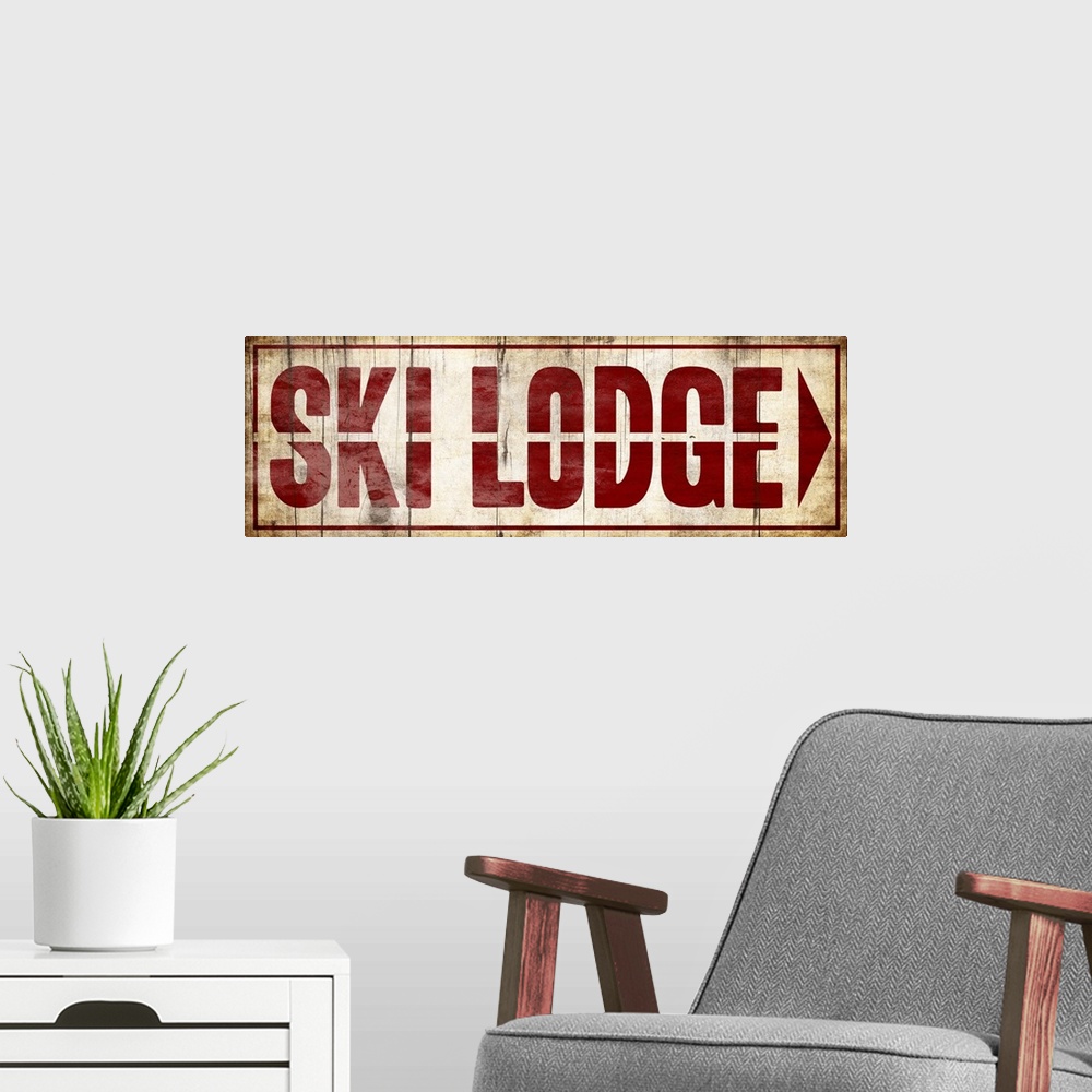 A modern room featuring Sign for a Ski Lodge with large red letters.