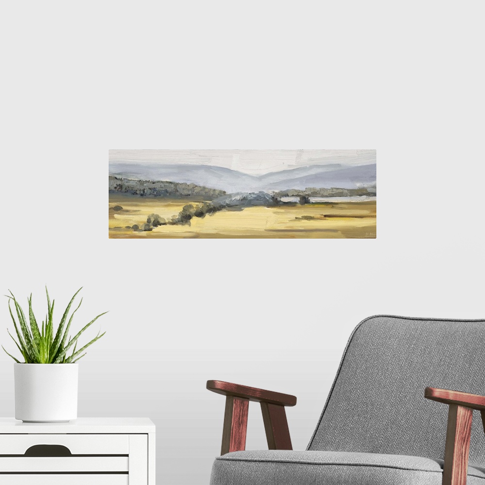 A modern room featuring Contemporary artwork of a countryside landscape.