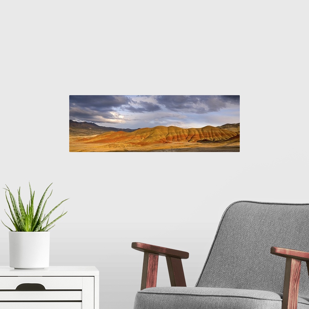 A modern room featuring USA, Oregon, John Day Fossil Beds National Monument. Panoramic of the Painted Hills and storm clo...