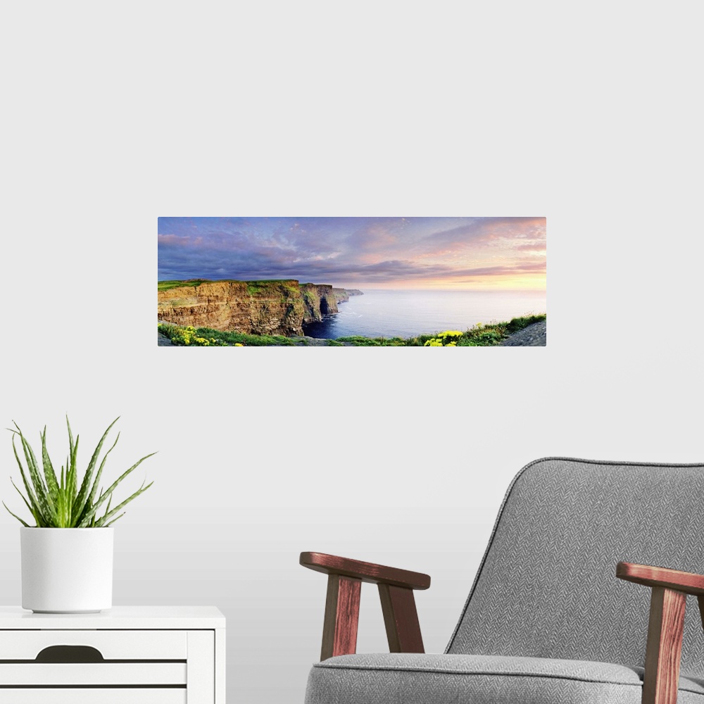 A modern room featuring Ireland, Galway, Sunset on Cliffs of Moher.