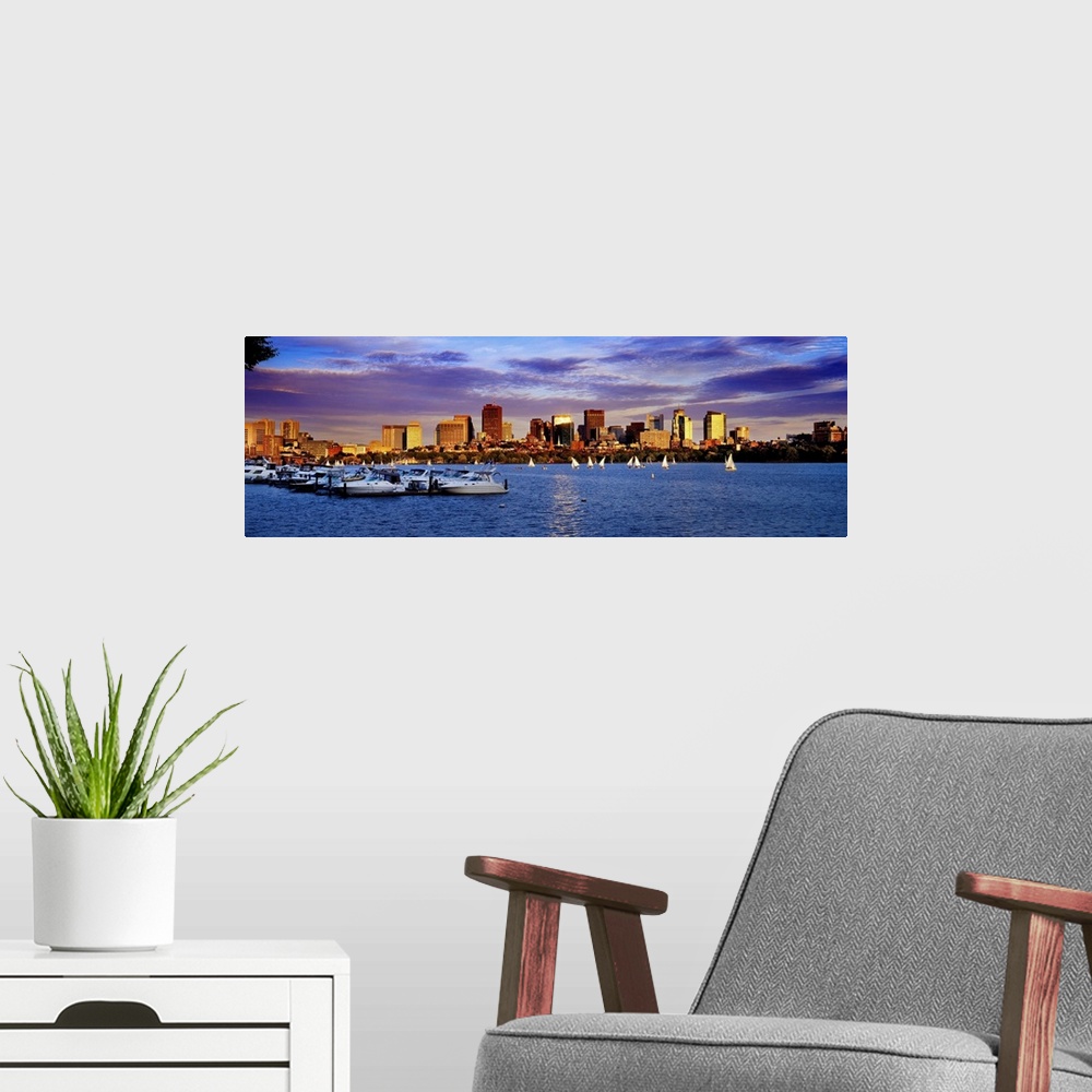 A modern room featuring Massachusetts, Boston, View of the skyline and the Charles River at sunset