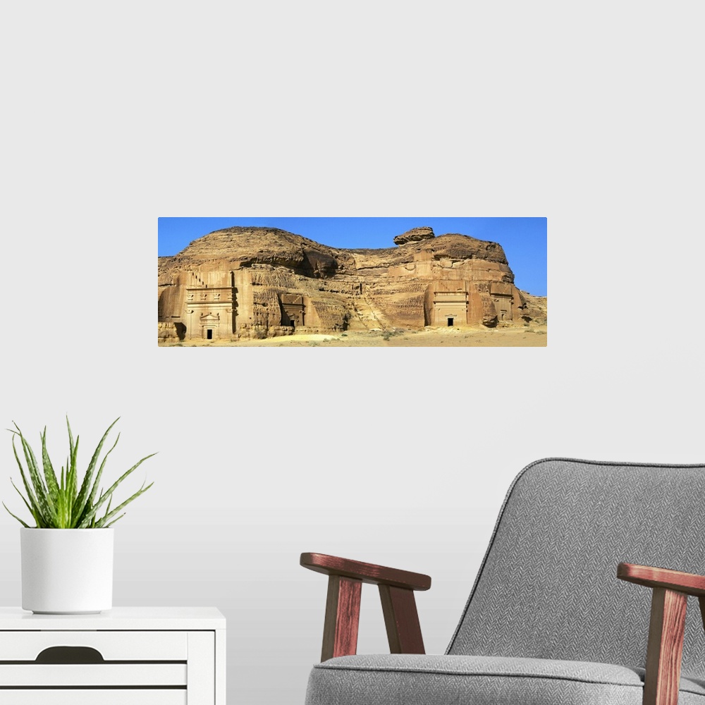 A modern room featuring Saudi Arabia, Al Madinah, Al-'Ula, Site of ancient Hegra, tombs of Nabatean