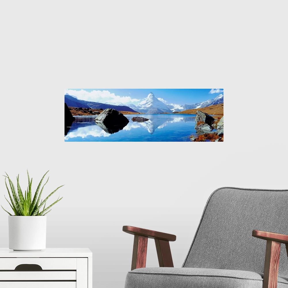 A modern room featuring Switzerland, Valais, Zermatt, Matterhorn mountain and Stelli lake