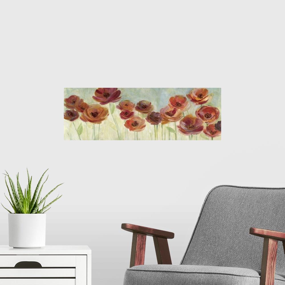 A modern room featuring Large, wide painting of red and orange poppy flowers in a field with a blue and green background.