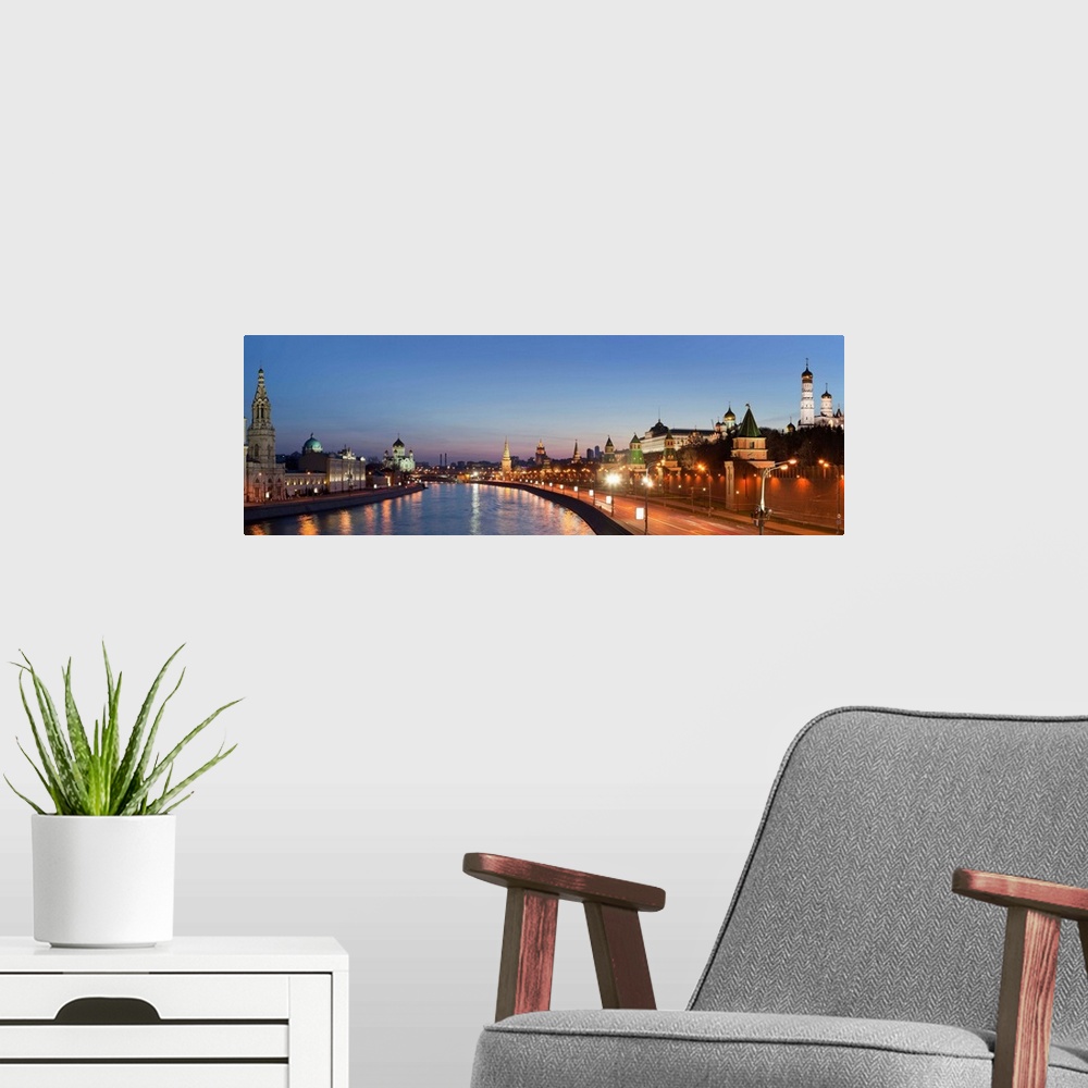 A modern room featuring Russia, Moscow, Moscow River, Cityscape with Cathedral of Christ the Saviour and Kremlin at dusk