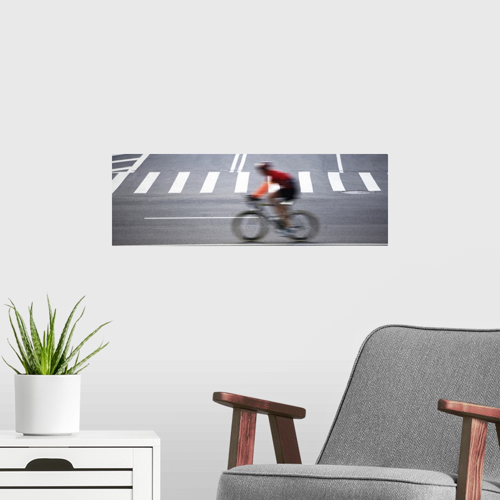A modern room featuring USA, New York City, Cyclist on street