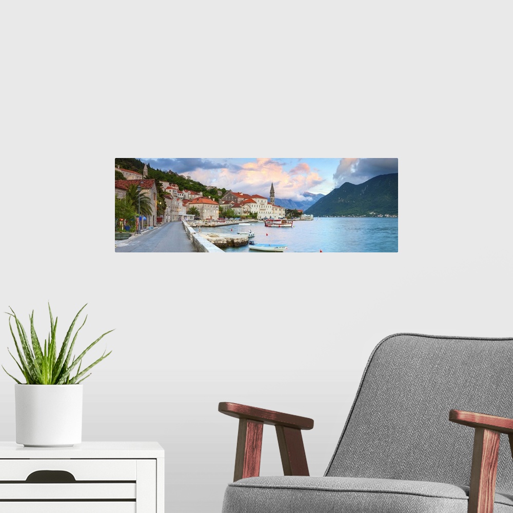 A modern room featuring The picturesque coastal village of Perast illuminated at sunset, Perast, Bay of Kotorska, Montenegro