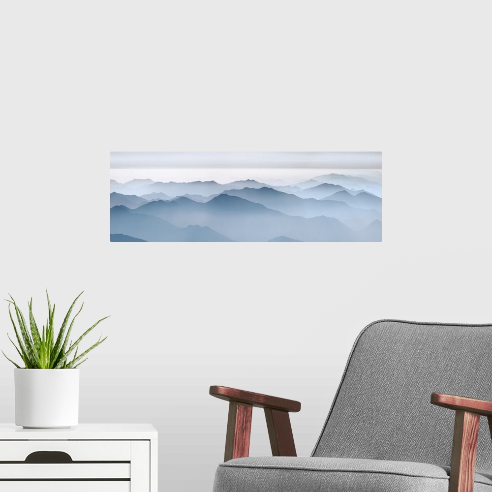 A modern room featuring Haze in hinterland of Huangshan. China, Anhui, Huangshan, Flying Over Rock. Yellow Mountain. Anhu...