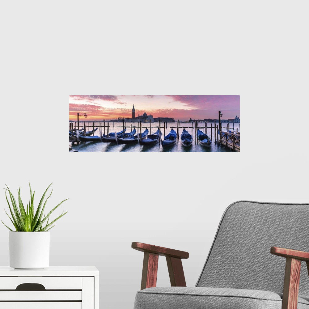 A modern room featuring Italy, Veneto, Venice. Row of gondolas moored at sunrise on Riva degli Schiavoni