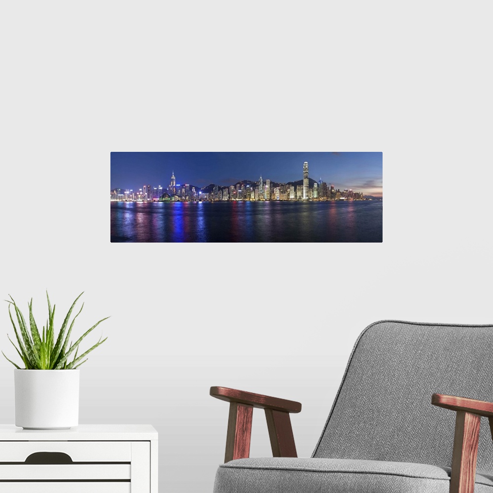 A modern room featuring Skyline of Central, Hong Kong Island, from Victoria Harbour, Hong Kong, China, Asia