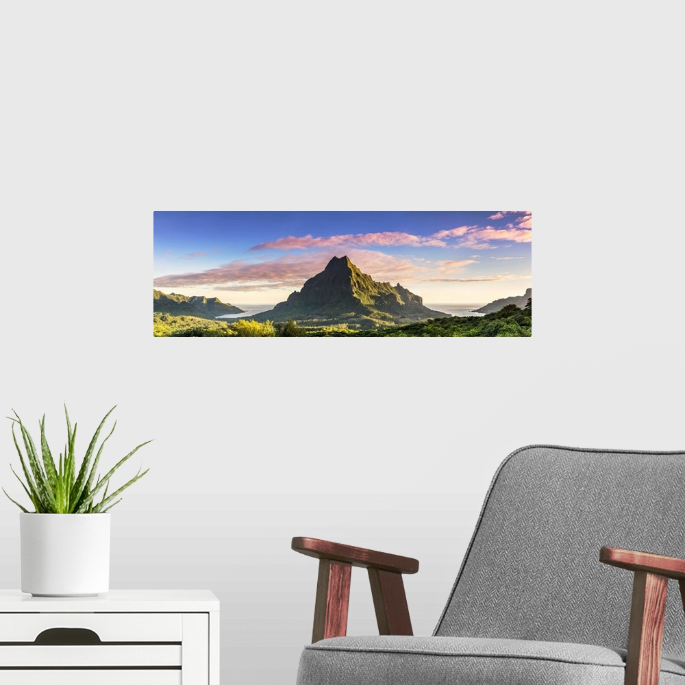 A modern room featuring Sunrise over Mt Rotui, Opunohu bay and Cook's bay, Moorea, French Polynesia.