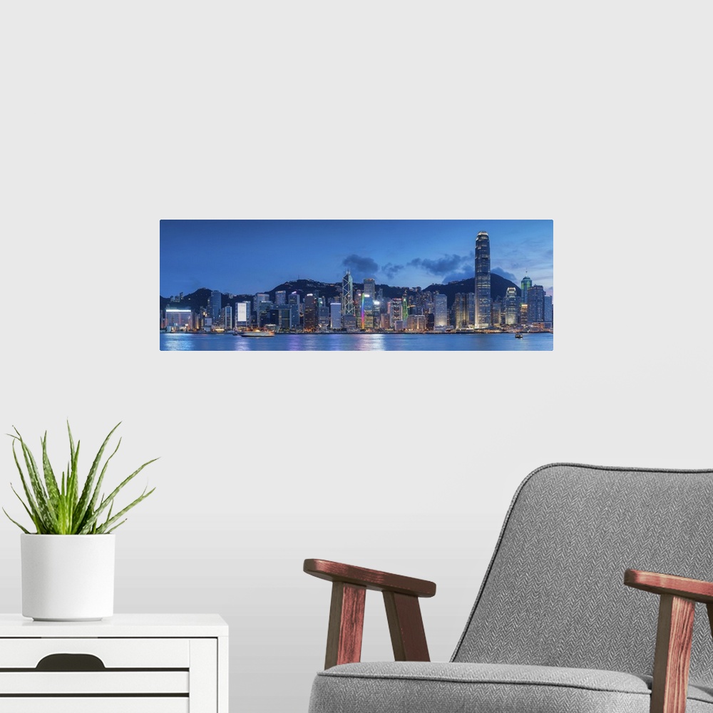 A modern room featuring View of Hong Kong Island skyline at sunset, Hong Kong