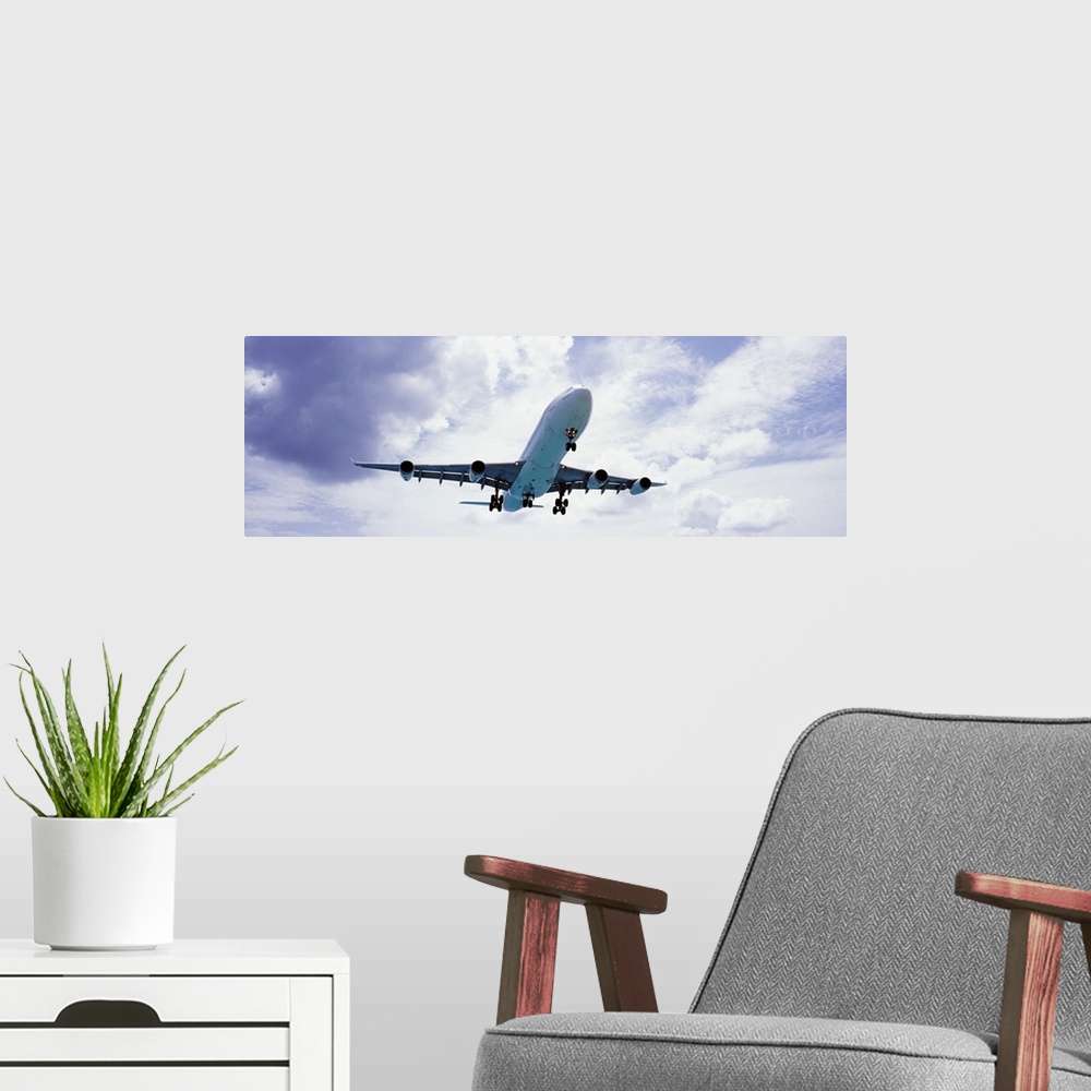 A modern room featuring An airplane in flight, Maho Beach, Sint Maarten, Netherlands Antilles
