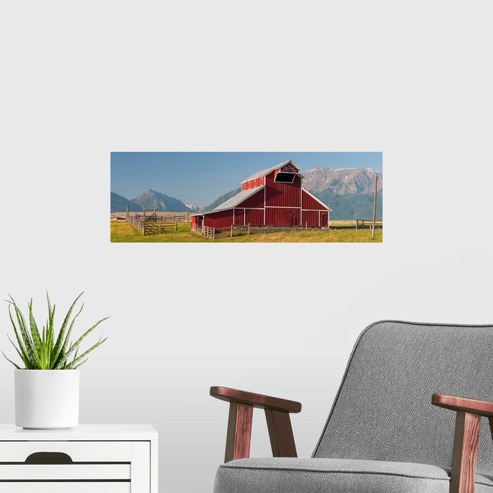 A modern room featuring Barn in a field with Wallowa Mountains in background, Enterprise, Oregon