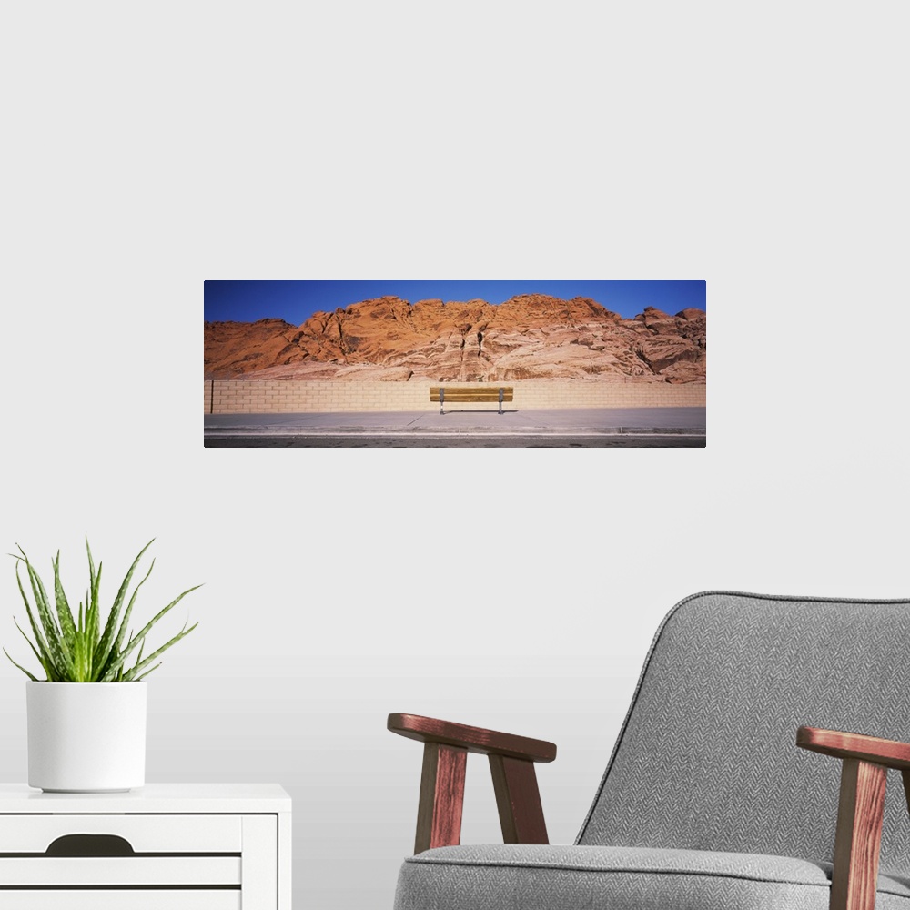 A modern room featuring Bench in front of rocks, Red Rock Canyon State Park, Nevada