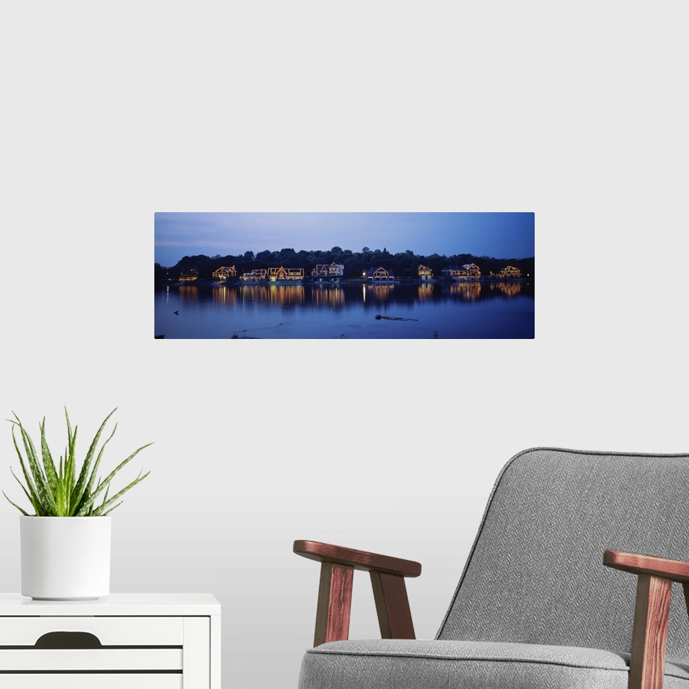 A modern room featuring Panoramic photo of Boathouse Row in Philadelphia, Pennsylvania (PA) at sundown. Lights on the hou...