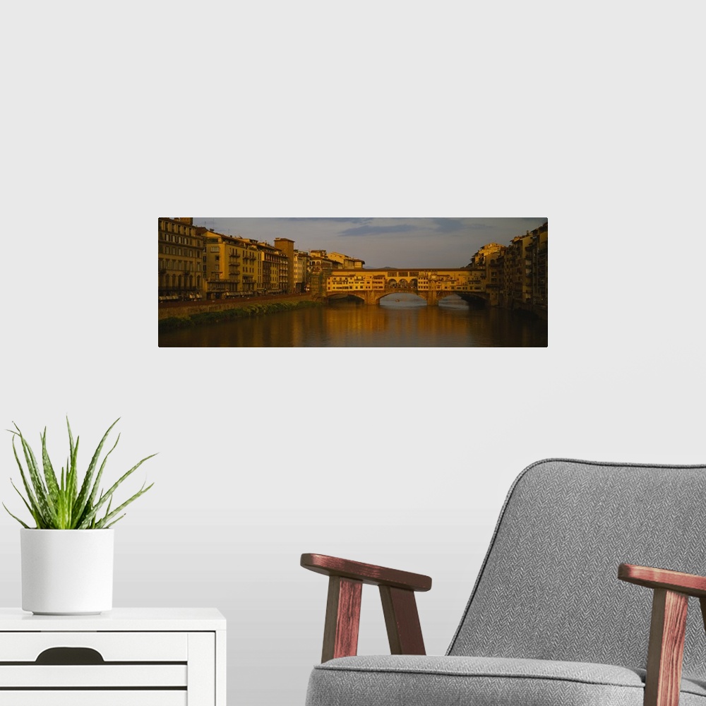 A modern room featuring Bridge across a river, Ponte Vecchio, Arno River, Florence, Tuscany, Italy