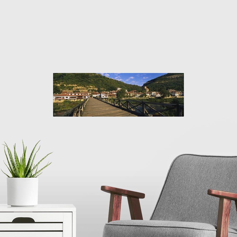 A modern room featuring Bridge across a river with a city in the background, Veliko Tarnovo, Bulgaria