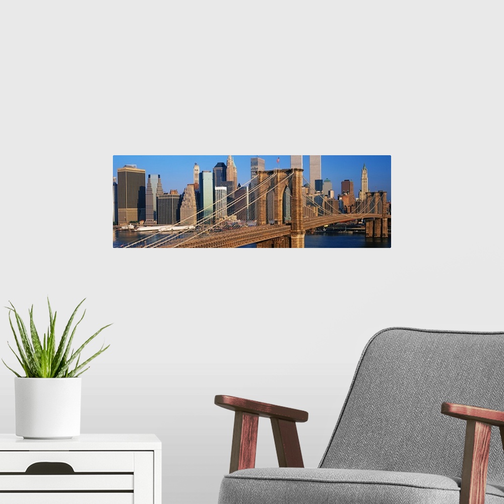 A modern room featuring Panoramic photograph of overpass with skyline in the background under a clear sky.