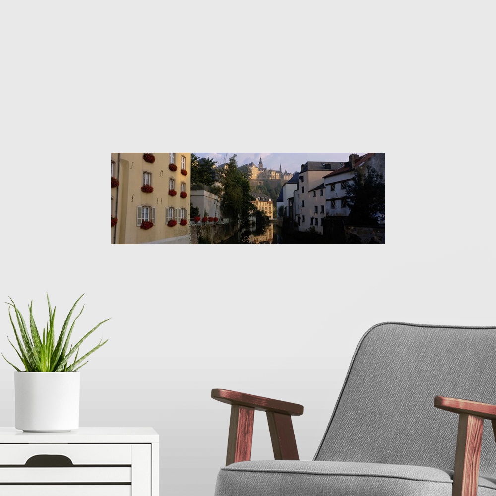 A modern room featuring Buildings along a river, Alzette River, Grund District, Luxembourg City, Luxembourg