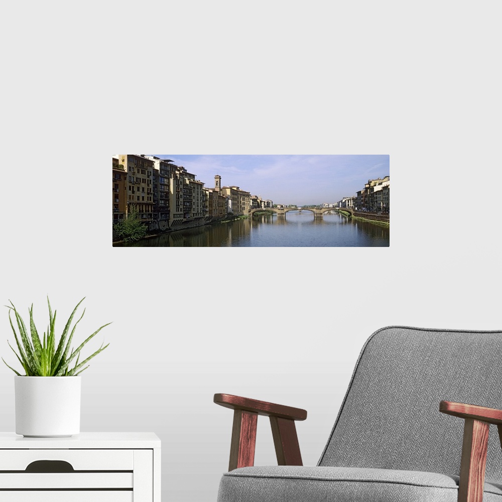 A modern room featuring Buildings along a river, Arno river, Florence, Tuscany, Italy