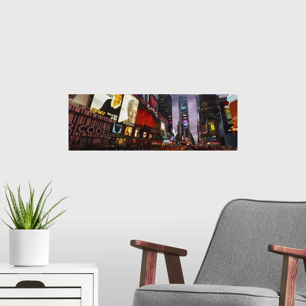 A modern room featuring This wall hanging for a home or office is a panoramic photograph taken at street level of the eno...