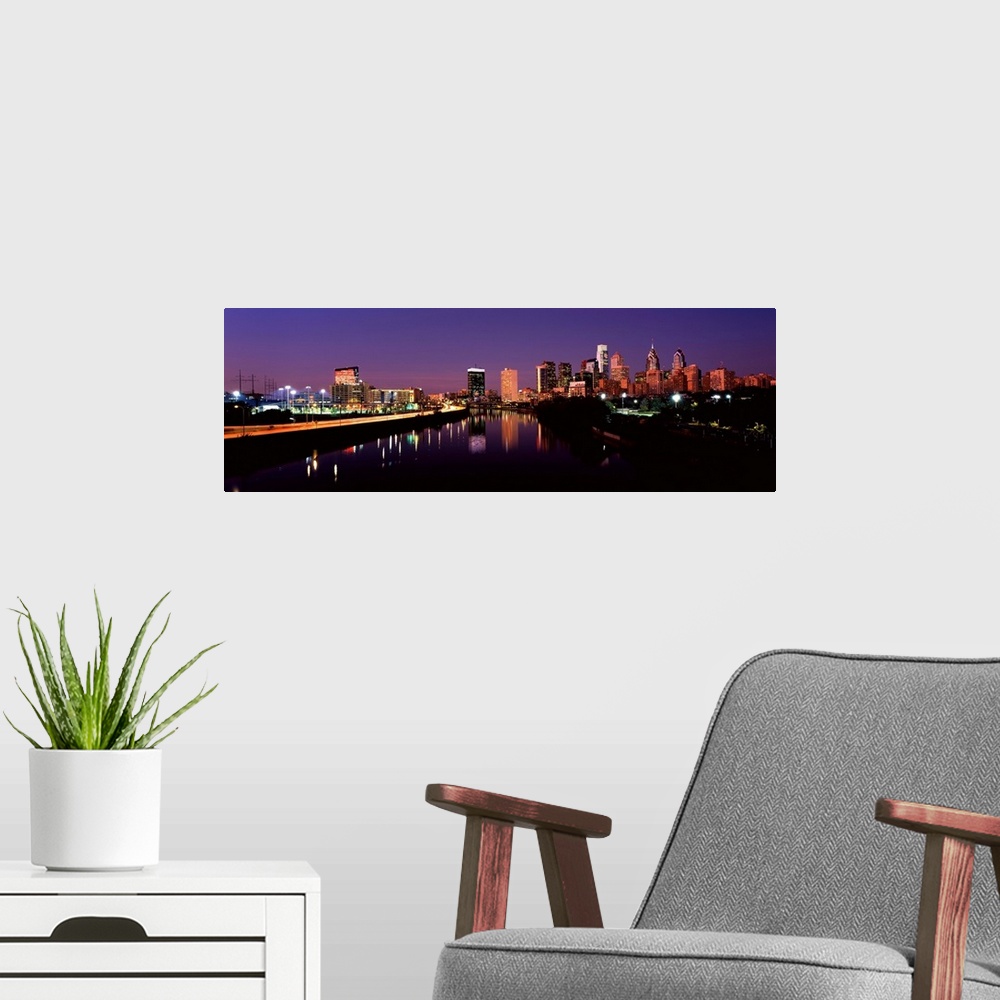 A modern room featuring Buildings lit up at the waterfront, Philadelphia, Schuylkill River, Pennsylvania