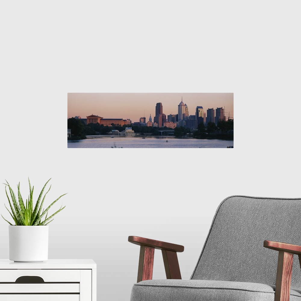 A modern room featuring Panoramic style picture of downtown Philadelphia with rowers working out on the Schuylkill River.