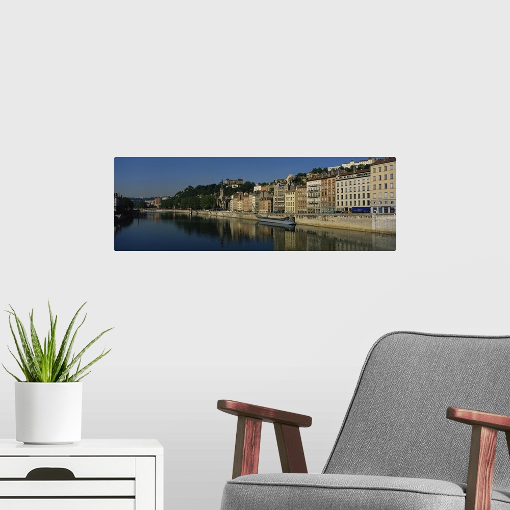 A modern room featuring Buildings on the waterfront, Saone River, Lyon, France