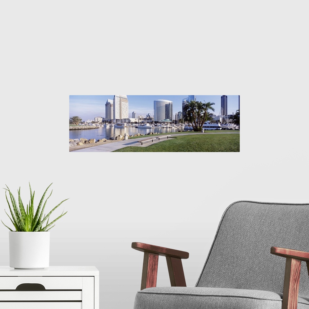 A modern room featuring View of San Diego, CA Marina Park with palm trees and skyline.