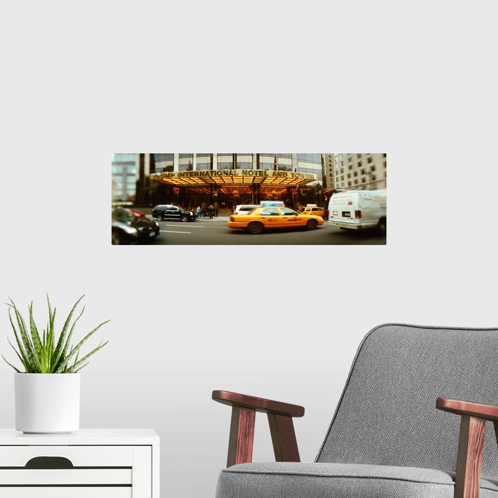 A modern room featuring Cars in front of a hotel Trump International Hotel And Tower Columbus Circle Manhattan New York C...